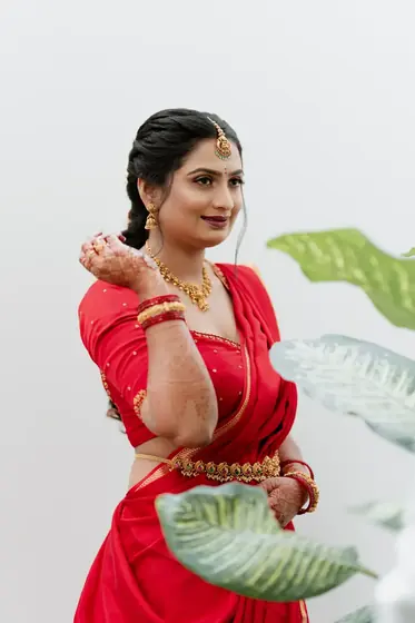 Gold on red — Likitha & Arun, Shivamogga